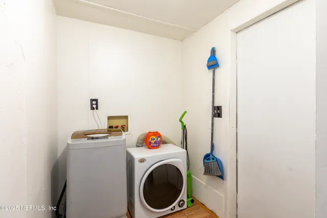 a utility room with dryer and washer
