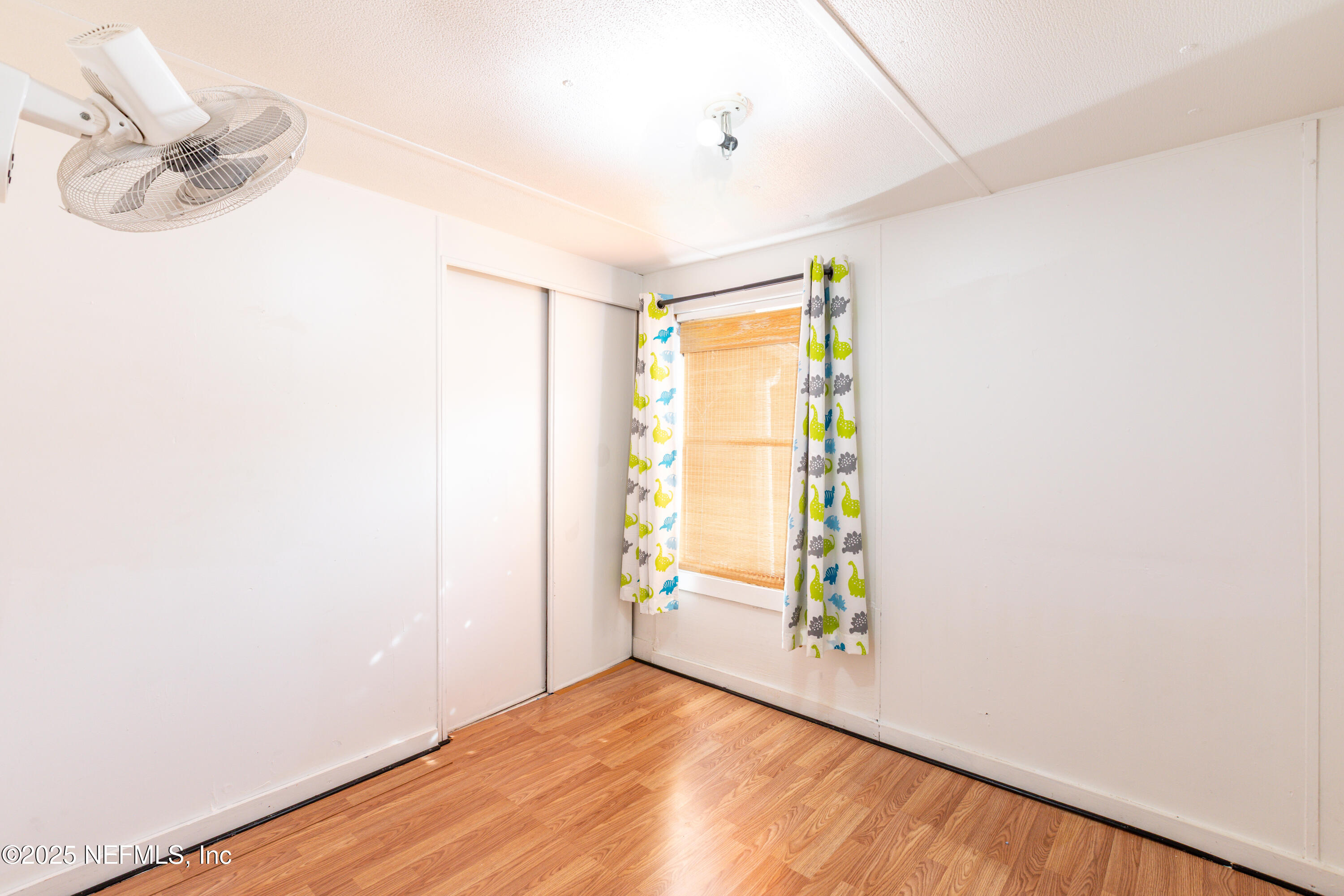 6336 Bucknell Avenue Keystone Heights, FL 32656 - Photo 13 of 18 a view of an empty room with a window