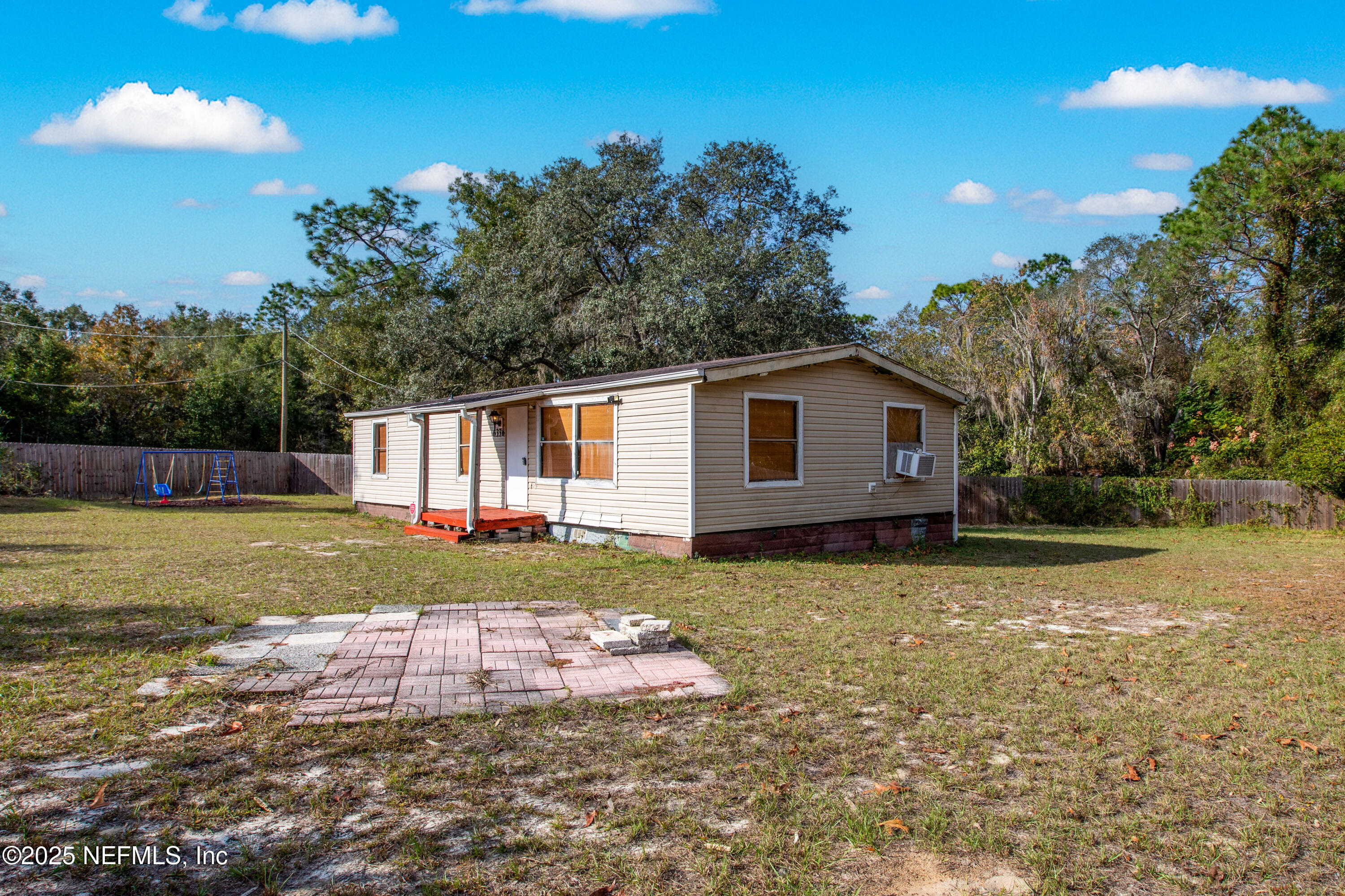 6336 Bucknell Avenue Keystone Heights, FL 32656 - Photo 3 of 18 a view of backyard with swimming pool of house