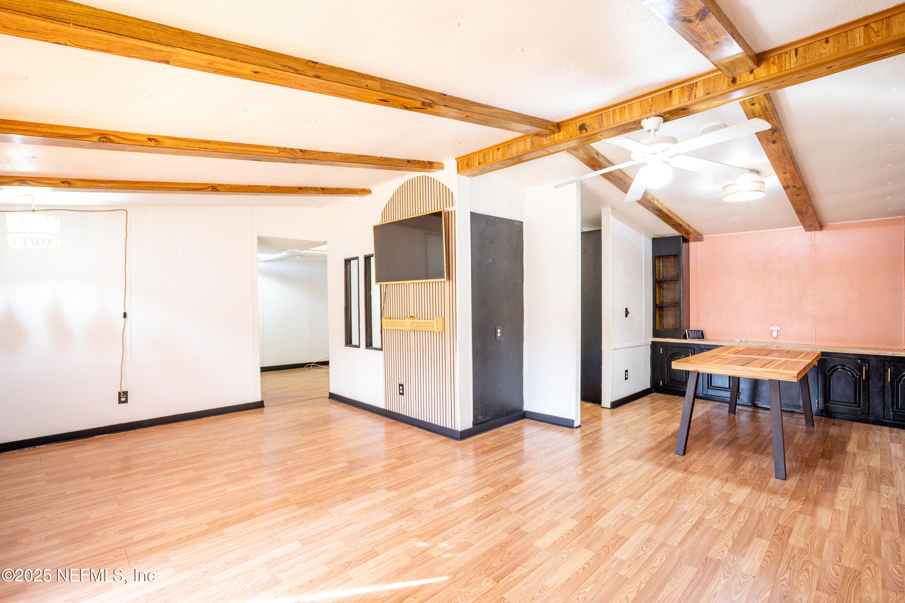 6336 Bucknell Avenue Keystone Heights, FL 32656 - Photo 6 of 18 a view of a room with wooden floor