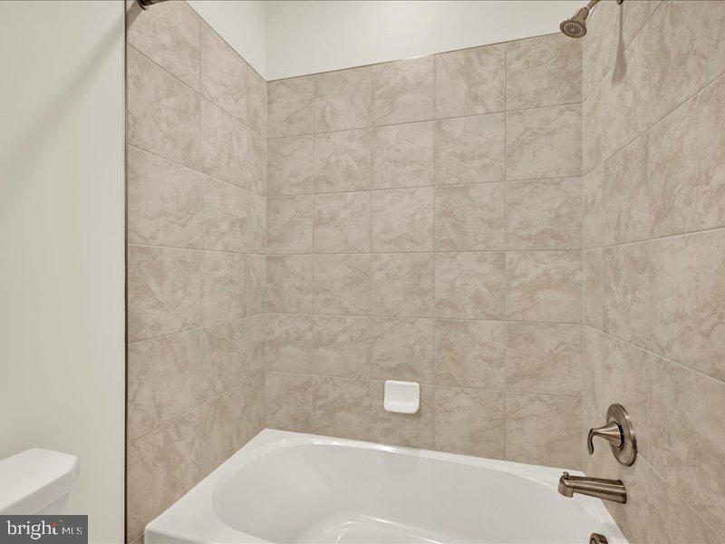 4003 Seaside Alder Road, Unit 307 HOLLY Bowie, MD 20720 - Photo 24 of 28 a bathroom with a sink