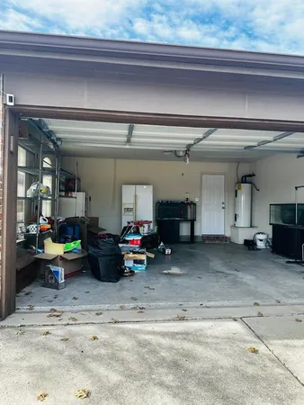 a view of a storage & utility room with washer and dryer