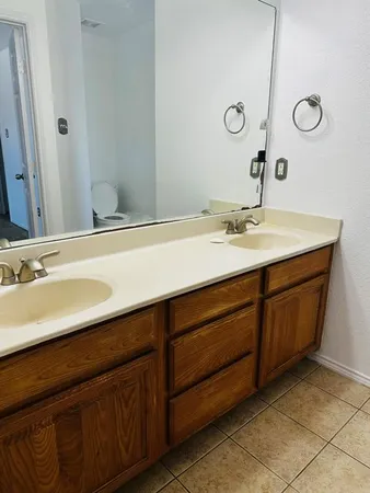 a bath tub sitting in a bathroom next to a window