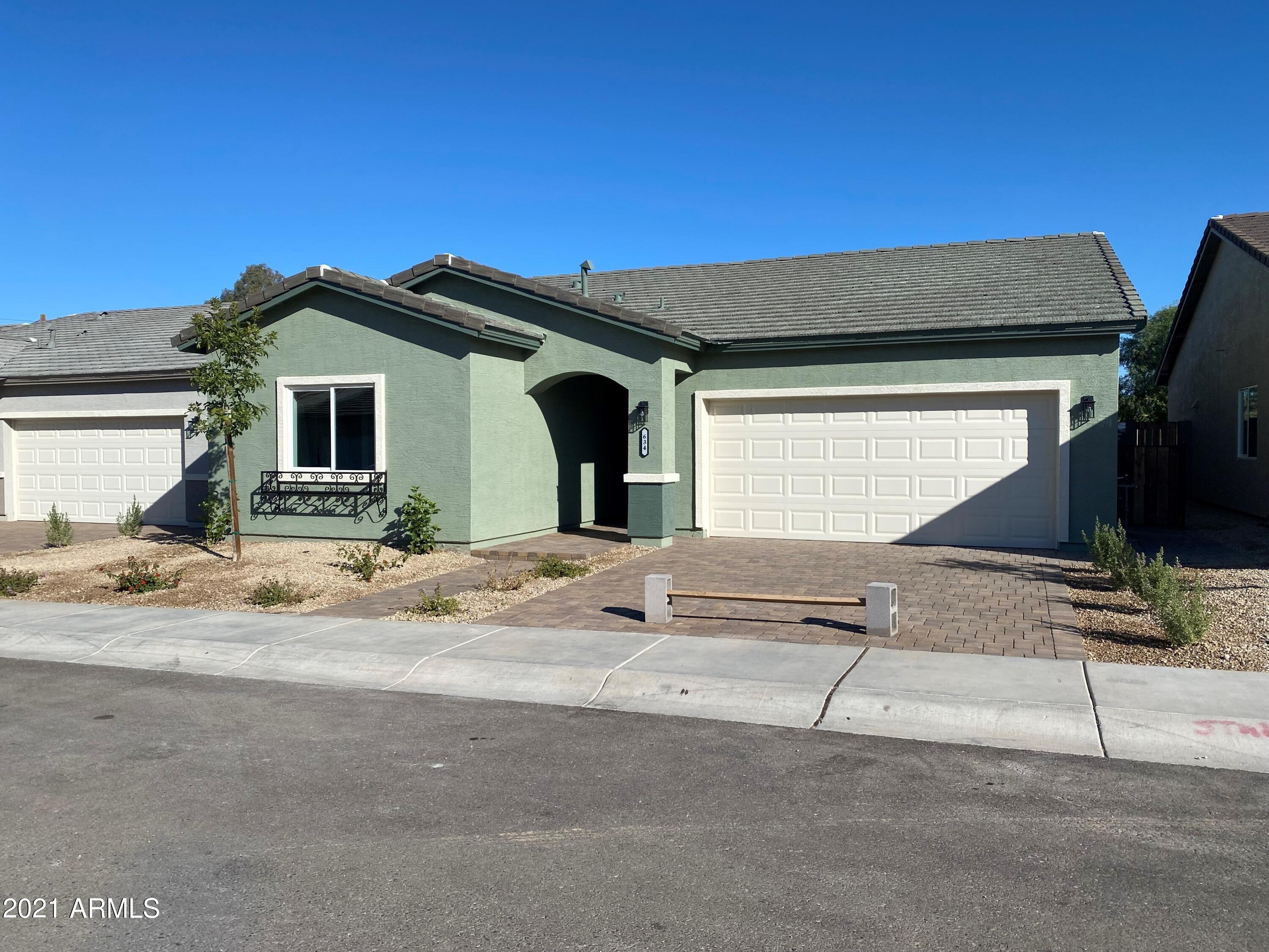 634 West Beverly Rd. Phoenix, AZ 85041 - Photo 1 of 14 a view of a house with a patio