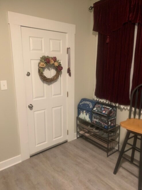 31 Snowling Road, Unit 2 Uxbridge, MA 01569 - Photo 3 of 6 a view of entryway with livingroom and furniture