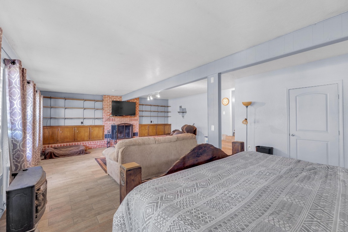 148 Meadows Drive Elgin, TX 78621 - Photo 18 of 38 a bed room with a bed and a view of bedroom