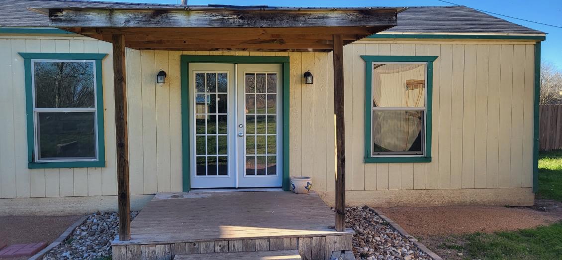 148 Meadows Drive Elgin, TX 78621 - Photo 37 of 38 a view of front door of house
