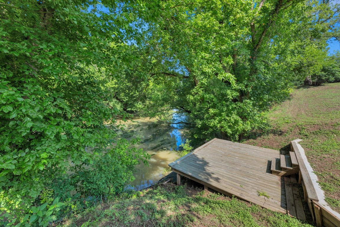148 Meadows Drive Elgin, TX 78621 - Photo 5 of 38 a view of a backyard with seating area