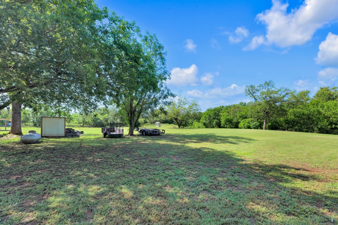 148 Meadows Drive Elgin, TX 78621 - Photo 6 of 38 a view of a house with a big yard