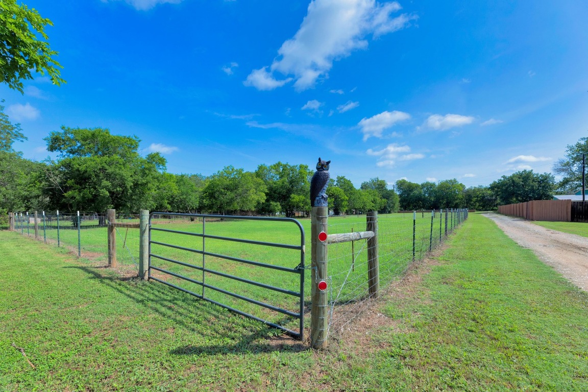 148 Meadows Drive Elgin, TX 78621 - Photo 9 of 38 a view of a park with large trees