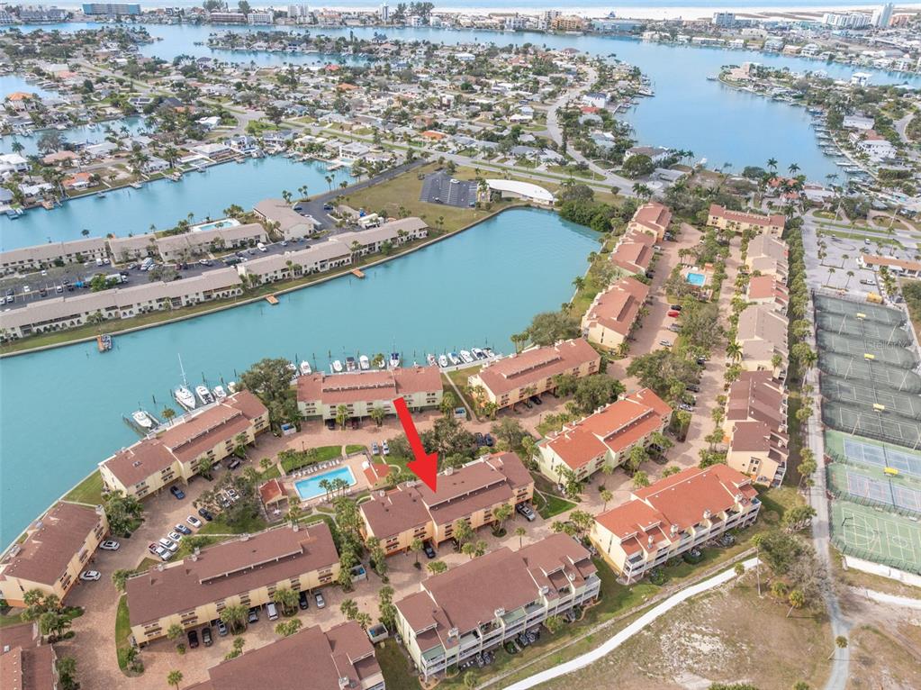 529 Sandy Hook Road Treasure Island, FL 33706 - Photo 44 of 55 an aerial view of a city with lake
