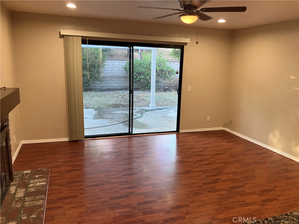 19933 Ralph Street Walnut, CA 91789 - Photo 29 of 77 a view of room with window and wooden floor