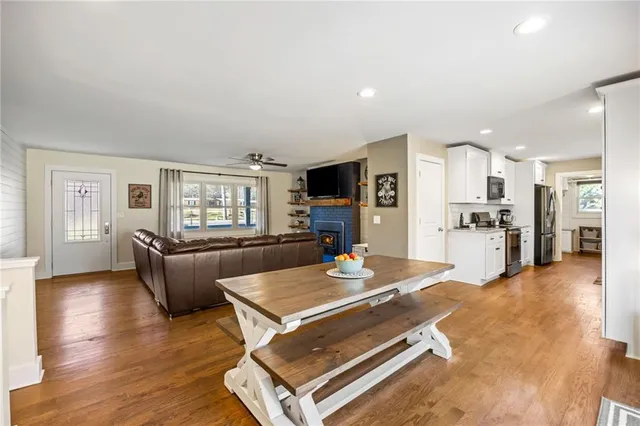 a living room with furniture and a table