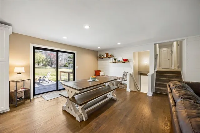 a room with furniture and a wooden floor