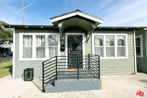 a front view of a house with a porch