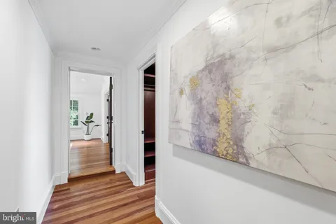 a bathroom with a granite countertop sink a mirror and a