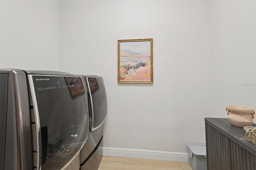 2304 Clement Road Lutz, FL 33549 - Photo 12 of 37 a bathroom with a shower and toilet