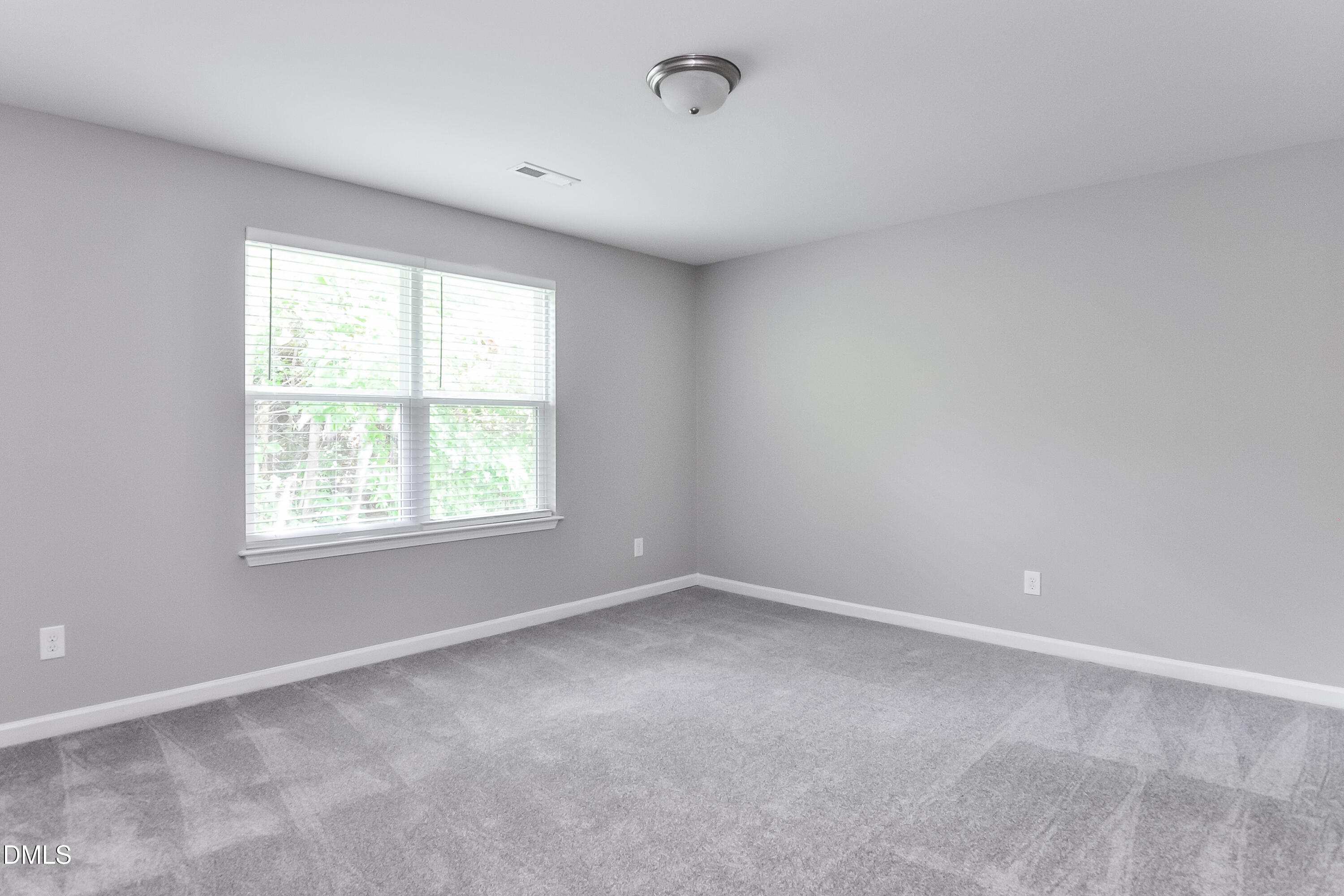 817 Leatherstone Lane Fuquay-Varina, NC 27526 - Photo 14 of 17 an empty room with a window