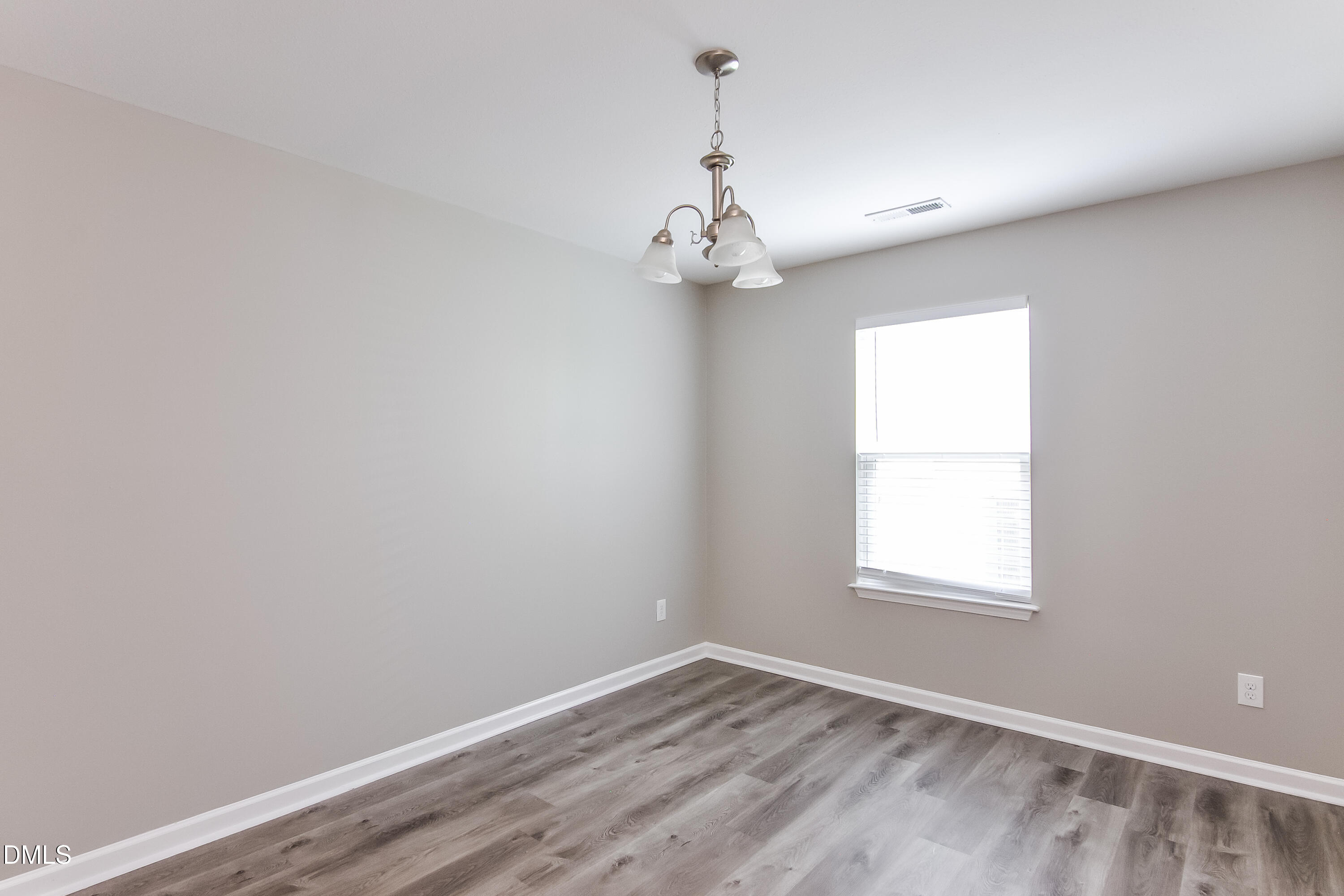 817 Leatherstone Lane Fuquay-Varina, NC 27526 - Photo 3 of 17 an empty room with a window