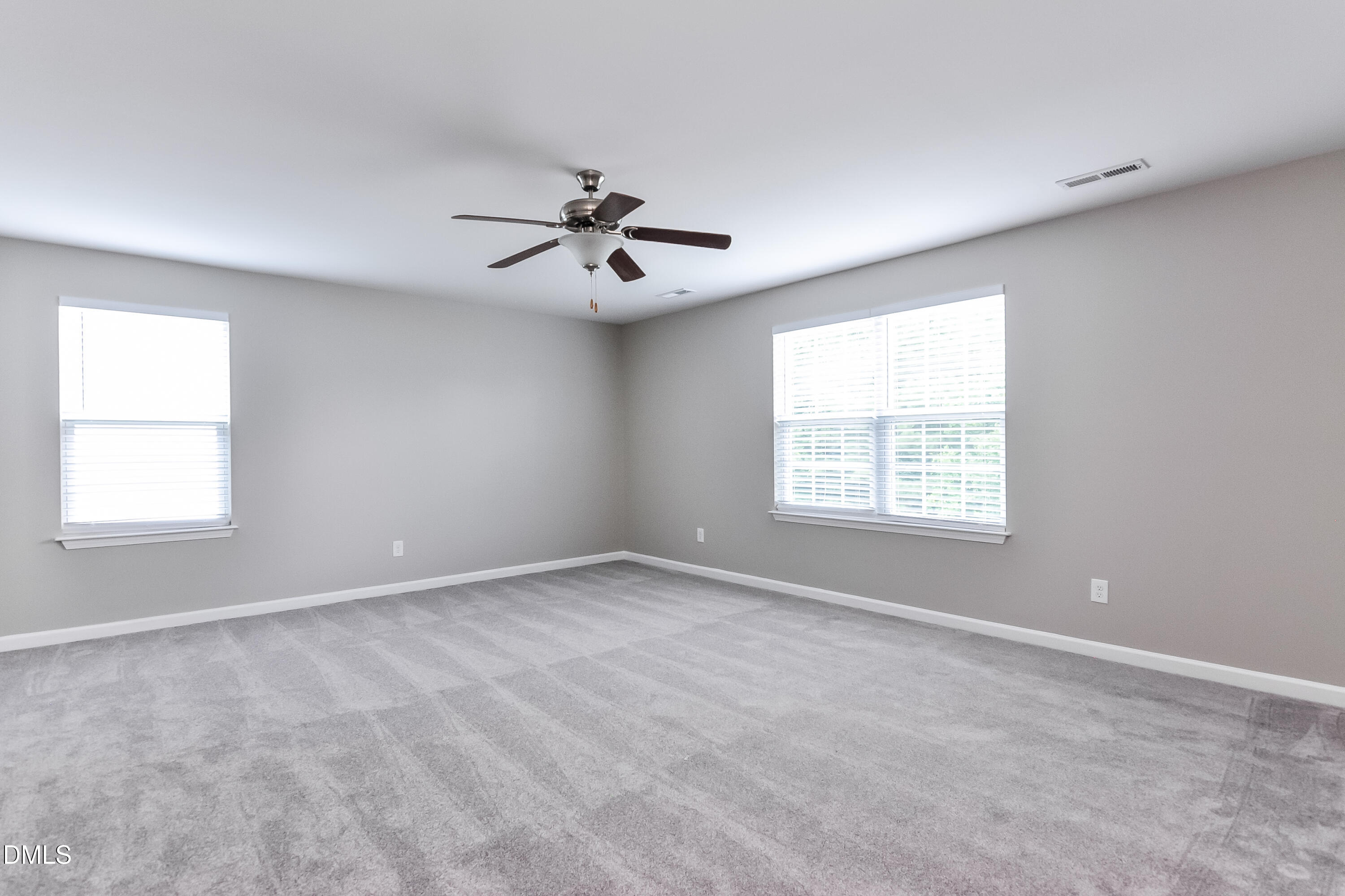 817 Leatherstone Lane Fuquay-Varina, NC 27526 - Photo 9 of 17 a view of an empty room with a window
