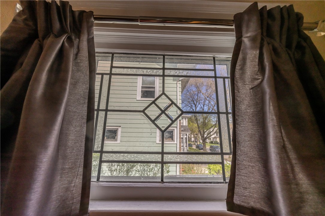 540 Augustine Street Rochester, NY 14613 - Photo 16 of 49 LEADED GLASS WINDOW BY STAIRCASE