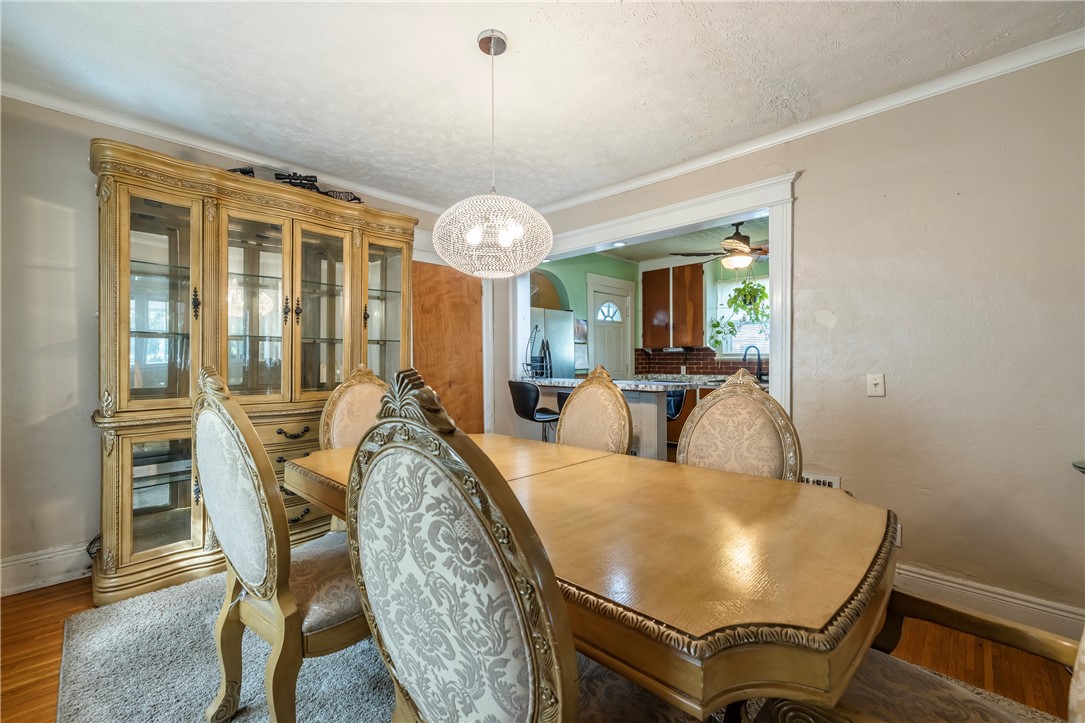 540 Augustine Street Rochester, NY 14613 - Photo 18 of 49 BEAUTIFUL DINING ROOM OPEN TO BREAKFAST BAR & KITC