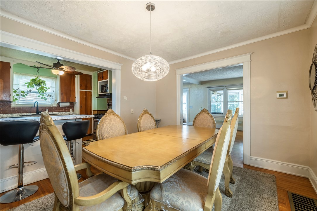 540 Augustine Street Rochester, NY 14613 - Photo 19 of 49 BEAUTIFUL DINING ROOM OPEN TO BREAKFAST BAR & KITC