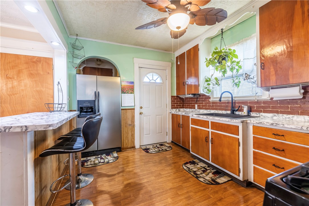 540 Augustine Street Rochester, NY 14613 - Photo 23 of 49 SPACIOUS KITCHEN WITH WOOD CABINETRY