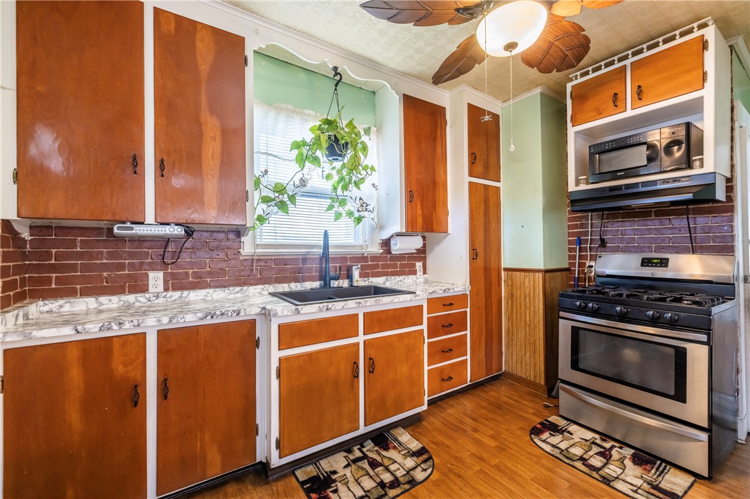 540 Augustine Street Rochester, NY 14613 - Photo 24 of 49 SPACIOUS KITCHEN WITH WOOD CABINETRY