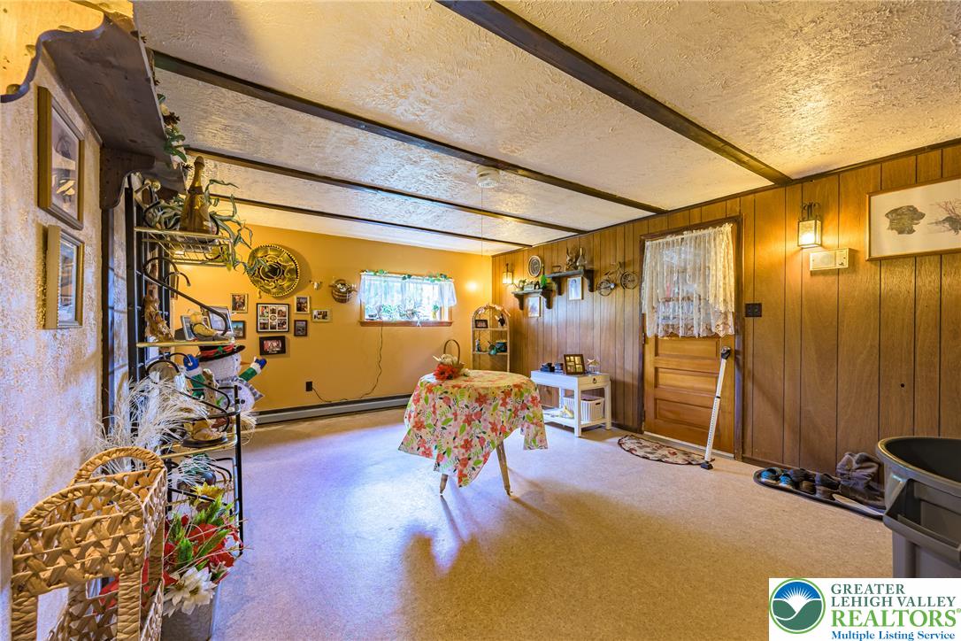 678 Interchange Road Kresgeville, PA 18333 - Photo 33 of 45 A quaint interior space offers warm wood paneling and a unique ceiling treatment.