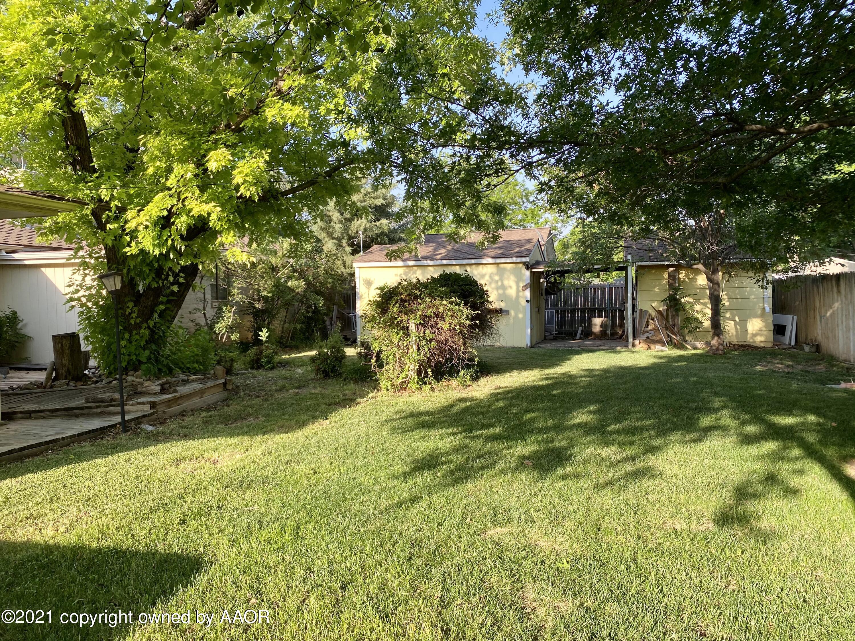 6021 Hanson Road Amarillo, TX 79106 - Photo 22 of 27 Backyard with Shop