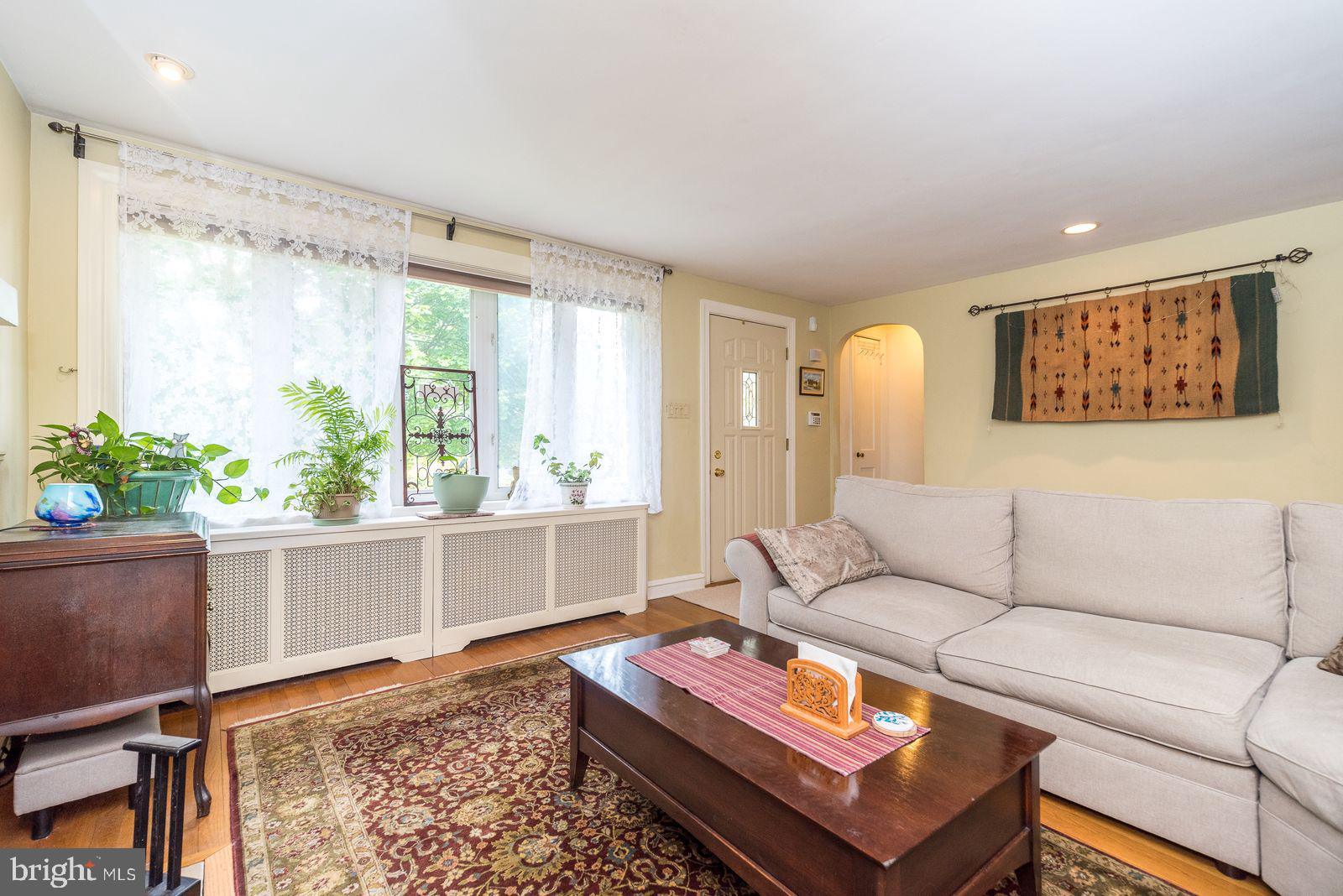 534 Pinney Road Huntingdon Valley, PA 19006 - Photo 6 of 26 a living room with furniture and a window