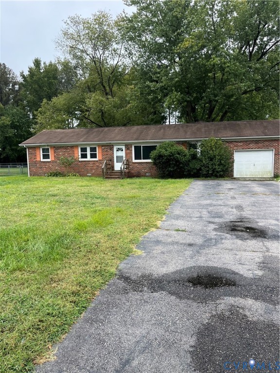 3517 Union Branch Road Petersburg, VA 23805 - Photo 1 of 5 a front view of a house with garden