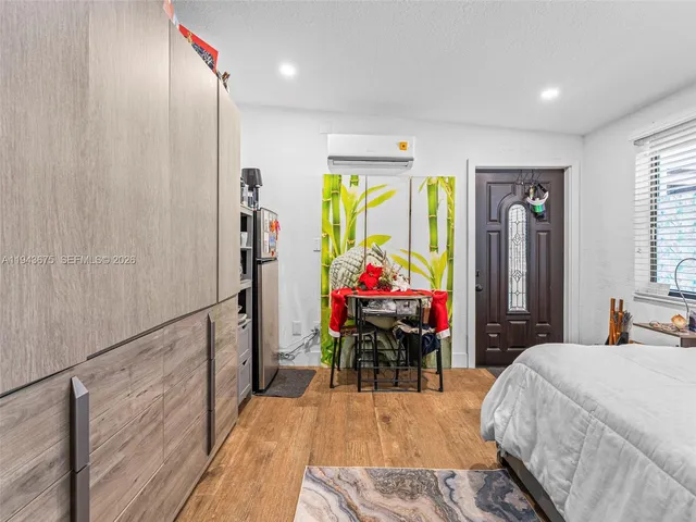 a view of a backyard with potted plants