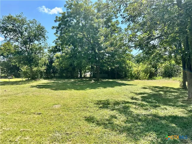 a view of outdoor space with swimming pool