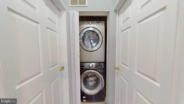 a view of washer and dryer in a utility room