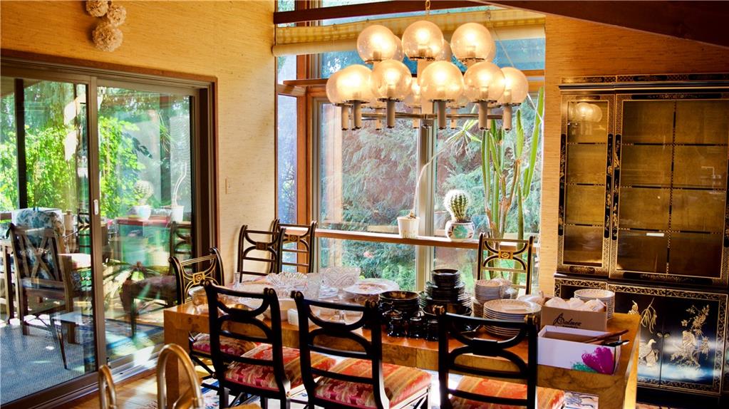747 Beacon Road Robinson Township, PA 15205 - Photo 9 of 20 a dining room with furniture and floor to ceiling windows