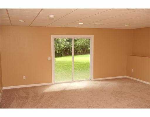 13 Leuba Road Coventry, RI 02816 - Photo 4 of 11 Den/Family/Great Room.