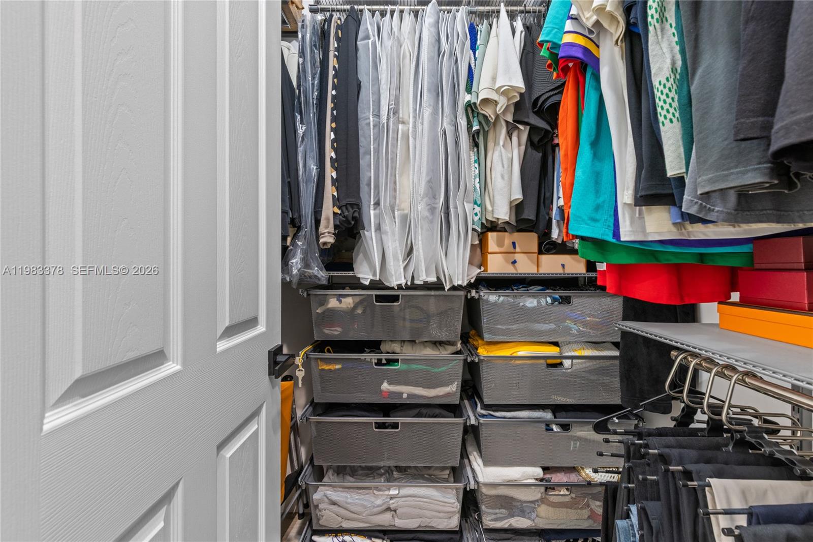 9094 Southwest 36th Street Miramar, FL 33025 - Photo 29 of 50 a view of walk in closet with clothes