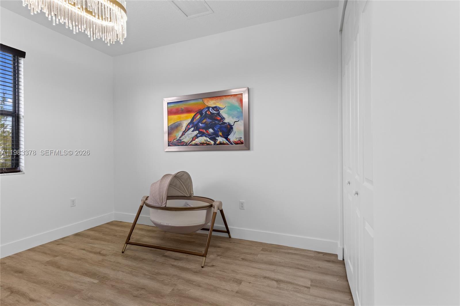 9094 Southwest 36th Street Miramar, FL 33025 - Photo 37 of 50 a room with painting on the wall and a window