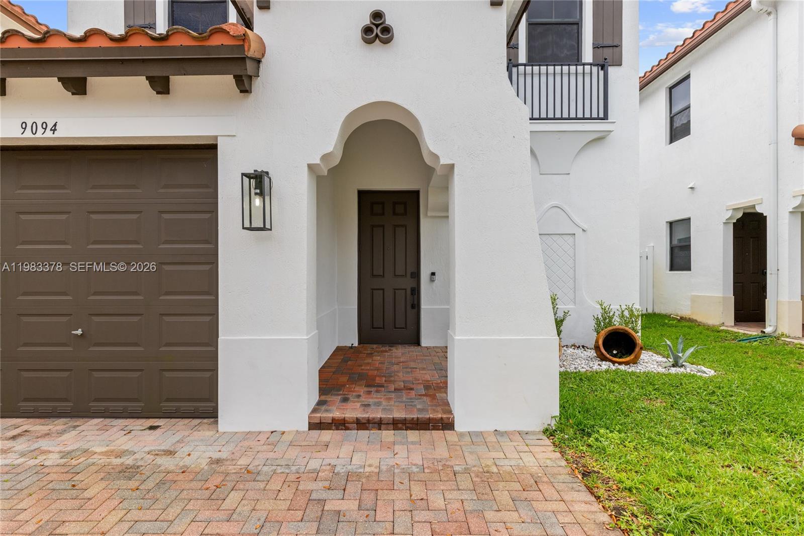9094 Southwest 36th Street Miramar, FL 33025 - Photo 48 of 50 a view of entryway with a garden