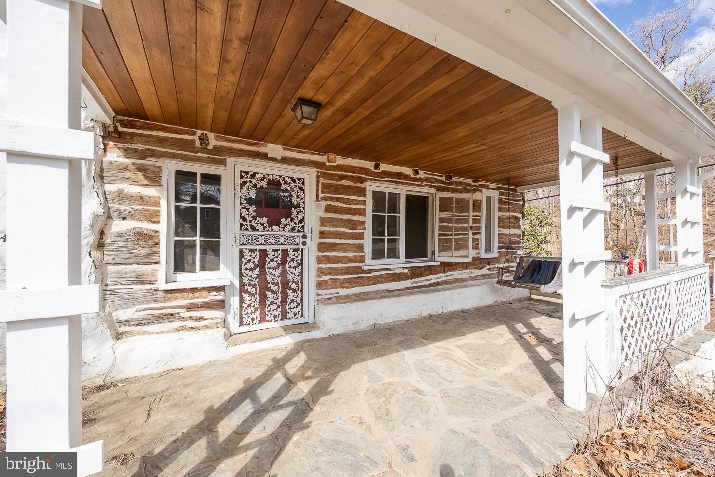 875 Old State Road Berwyn, PA 19312 - Photo 3 of 15 a view of a porch with a table and chairs
