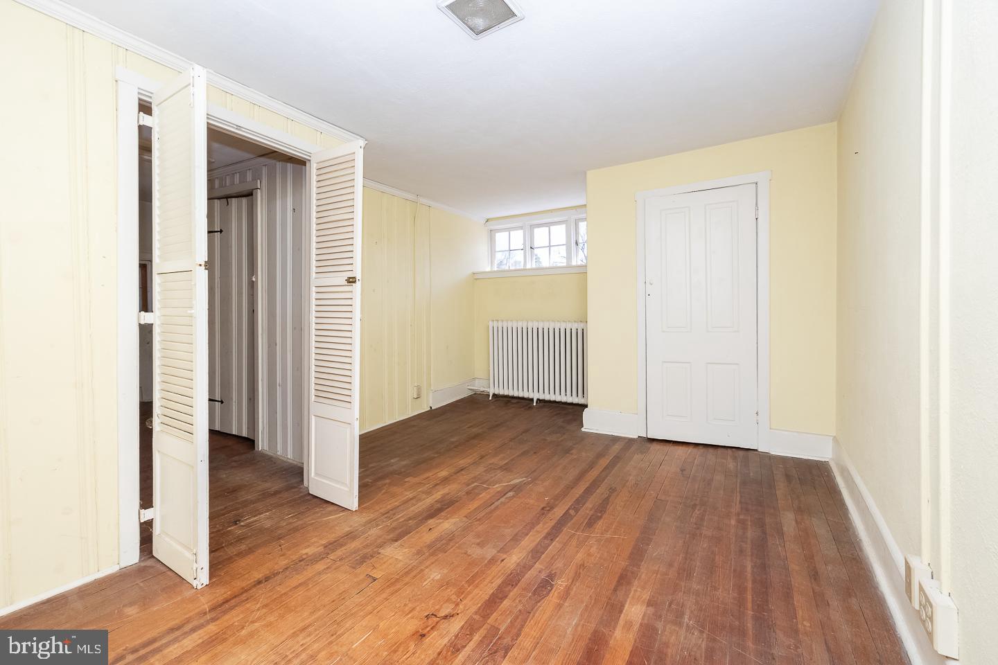 875 Old State Road Berwyn, PA 19312 - Photo 10 of 15 a view of a hallway with wooden floor