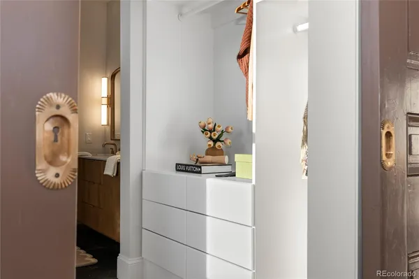a bathroom with a sink and mirror