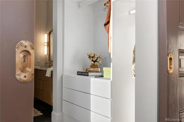 a bathroom with a sink and mirror