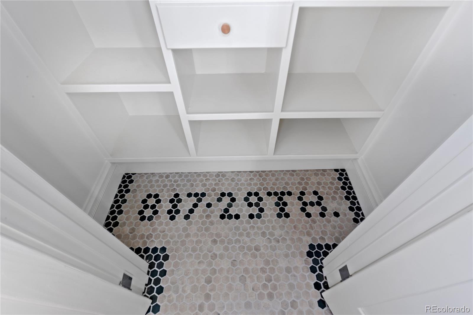 817 29th Street Denver, CO 80205 - Photo 25 of 33 a bathroom with a bathtub