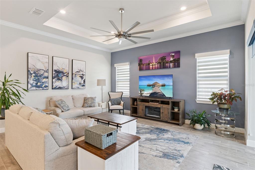 2745 Nature Vw Road St. Cloud, FL 34771 - Photo 14 of 50 a living room with furniture and a flat screen tv