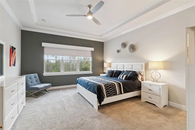 a bed room with a bed and a window