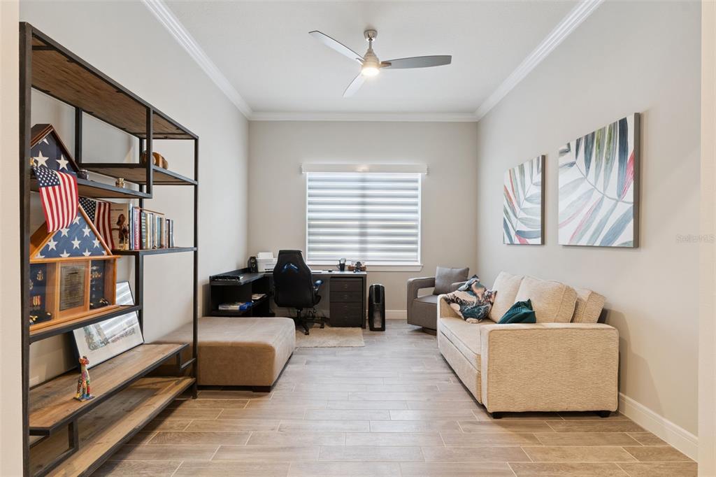 2745 Nature Vw Road St. Cloud, FL 34771 - Photo 20 of 50 a living room with furniture and a window