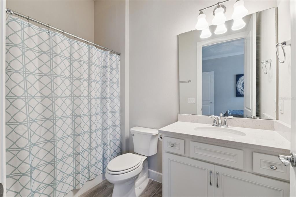 2745 Nature Vw Road St. Cloud, FL 34771 - Photo 23 of 50 a bathroom with a sink and a mirror
